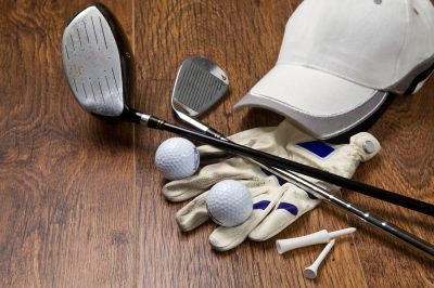 Golf,Equipment,On,Wooden,Table
